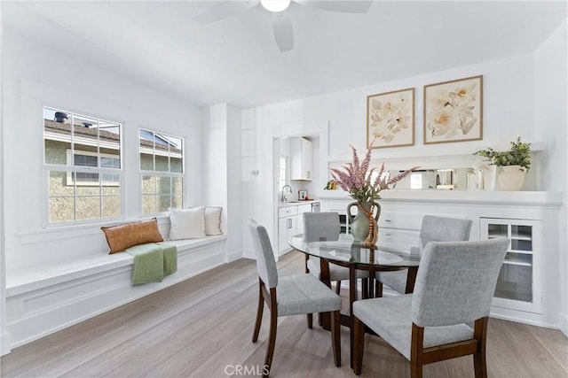 765 Loma Ave Unit 769, Long Beach, CA 90804 - dining room featuring light wood-style floors and ceiling fan