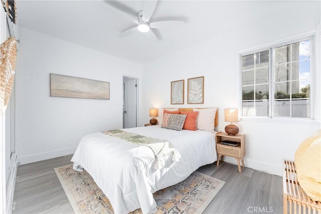 765 Loma Ave Unit 769, Long Beach, CA 90804 - bedroom with light wood-type flooring and ceiling fan