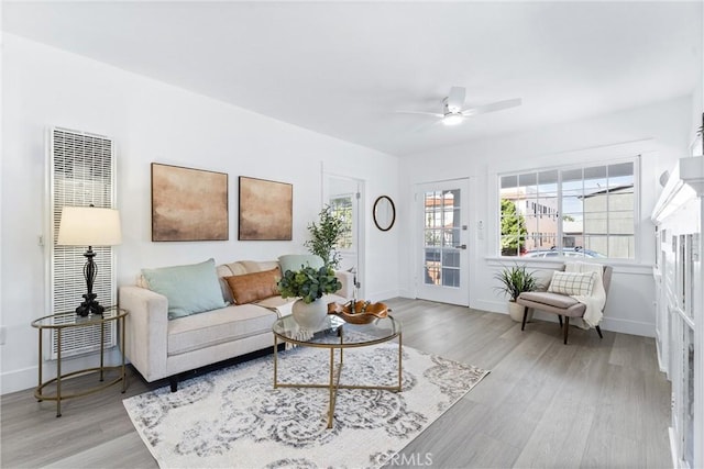 765 Loma Ave Unit 769, Long Beach, CA 90804 - living area with a heating unit, light wood-style floors, and ceiling fan