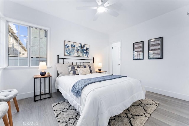 765 Loma Ave Unit 769, Long Beach, CA 90804 - bedroom with light wood-style flooring and ceiling fan