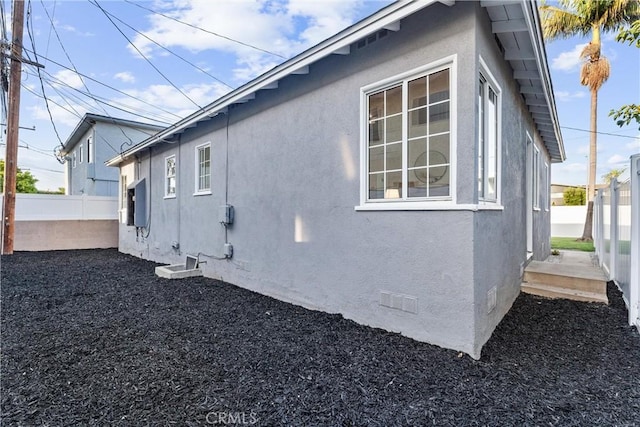 765 Loma Ave Unit 769, Long Beach, CA 90804 - view of side of property featuring stucco siding and crawl space