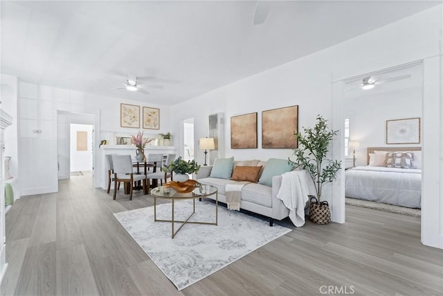 765 Loma Ave Unit 769, Long Beach, CA 90804 - living room featuring ceiling fan and wood finished floors