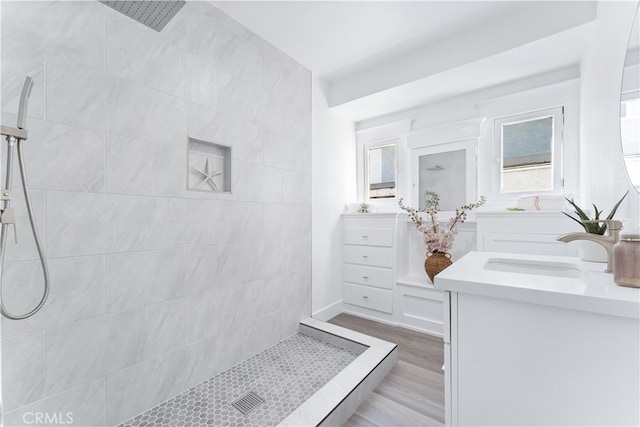765 Loma Ave Unit 769, Long Beach, CA 90804 - full bath featuring vanity, a tile shower, and wood finished floors