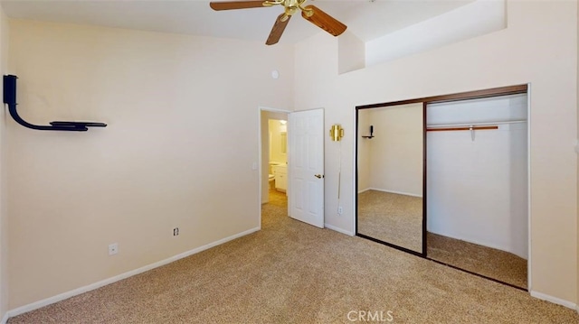 12429 Pocono Pl, Apple Valley, CA 92308 - unfurnished bedroom with carpet floors, a closet, a high ceiling, and a ceiling fan