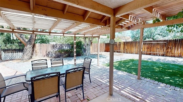 12429 Pocono Pl, Apple Valley, CA 92308 - fenced backyard with a pergola, a patio area, and outdoor dining space