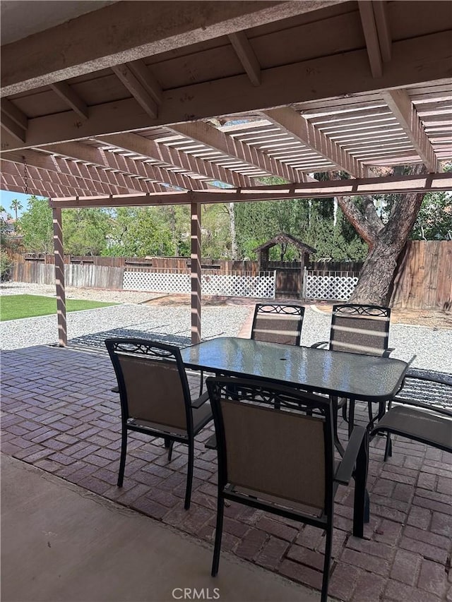12429 Pocono Pl, Apple Valley, CA 92308 - fenced backyard featuring a pergola, a patio, and outdoor dining space