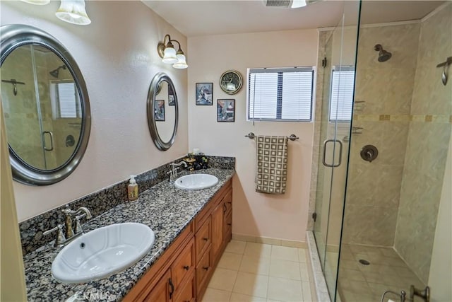17149 Gledhill St, Northridge, CA 91325 - full bathroom with a stall shower, tile patterned flooring, and double vanity
