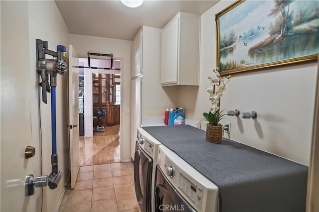 17149 Gledhill St, Northridge, CA 91325 - laundry room with cabinet space, independent washer and dryer, and light tile patterned floors