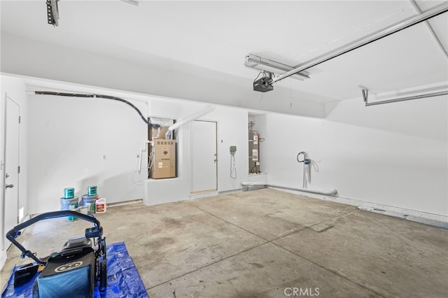 22710 Robin Way, Grand Terrace, CA 92313 - garage featuring a garage door opener and strapped water heater