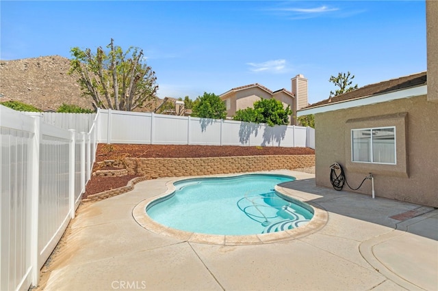 22710 Robin Way, Grand Terrace, CA 92313 - view of pool featuring a patio and a fenced backyard
