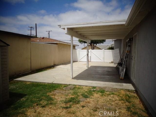 15728 Stevens Ave, Bellflower, CA 90706 - view of patio / terrace with a gate