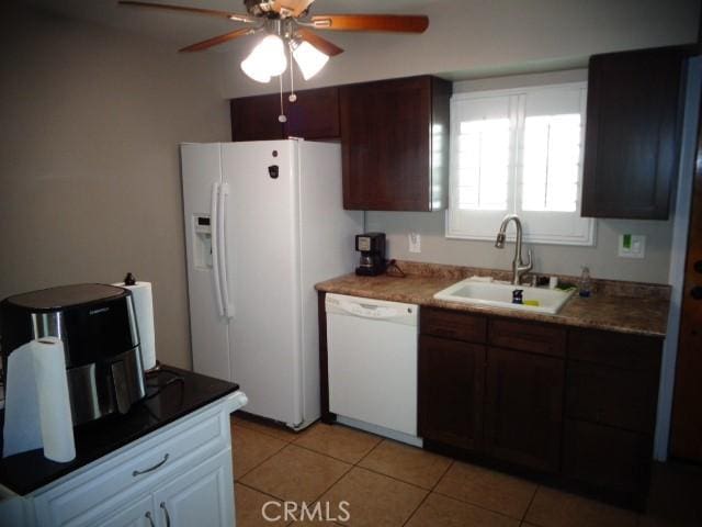 15728 Stevens Ave, Bellflower, CA 90706 - kitchen with white appliances, ceiling fan, and light tile patterned flooring