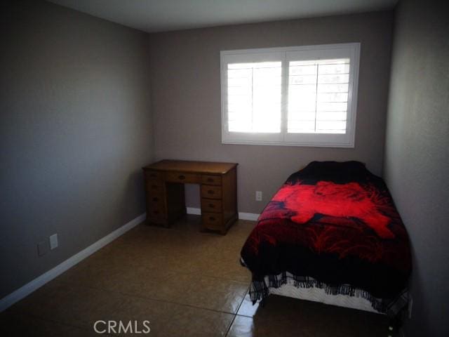 15728 Stevens Ave, Bellflower, CA 90706 - tiled bedroom with baseboards