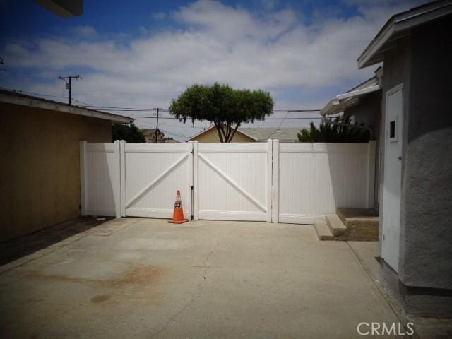 15728 Stevens Ave, Bellflower, CA 90706 - view of patio / terrace with a gate