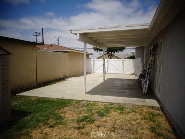 15728 Stevens Ave, Bellflower, CA 90706 - view of patio with a gate