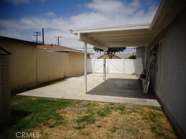15728 Stevens Ave, Bellflower, CA 90706 - view of patio / terrace with a gate