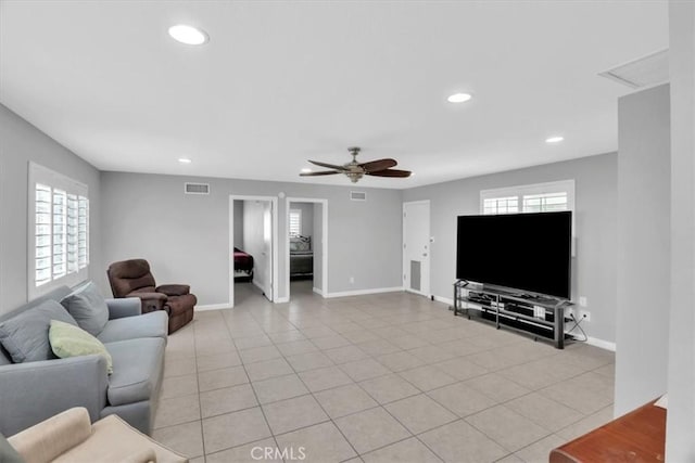 15728 Stevens Ave, Bellflower, CA 90706 - living area featuring recessed lighting, healthy amount of natural light, ceiling fan, and light tile patterned flooring