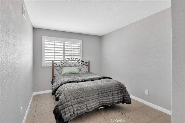 15728 Stevens Ave, Bellflower, CA 90706 - bedroom featuring baseboards and tile patterned floors