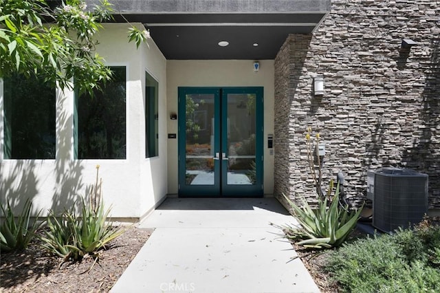 145 Sash, Irvine, CA 92618 - property entrance featuring french doors and stucco siding