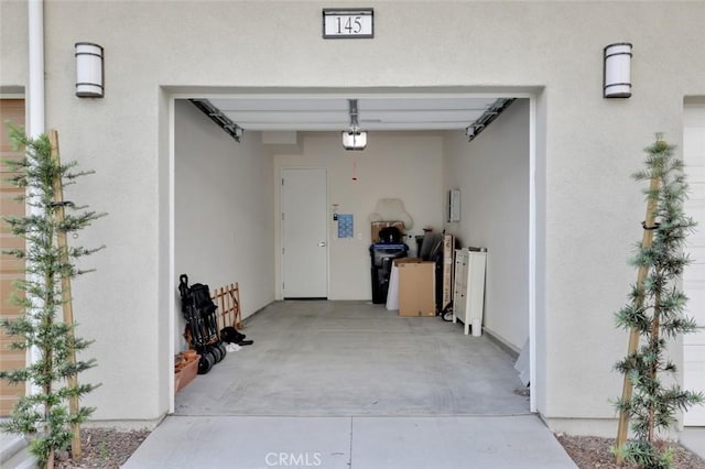 145 Sash, Irvine, CA 92618 - garage featuring a garage door opener
