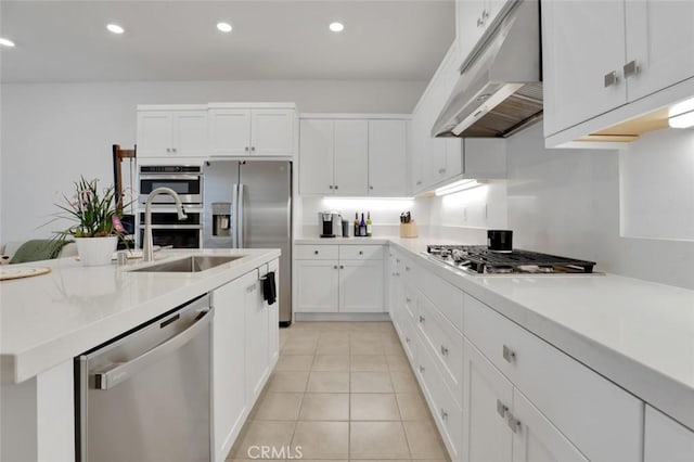 145 Sash, Irvine, CA 92618 - kitchen featuring extractor fan, stainless steel appliances, white cabinets, light countertops, and recessed lighting
