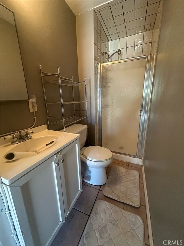 3641 W Oak Ave, Fullerton, CA 92833 - full bath with a stall shower, vanity, and tile patterned floors