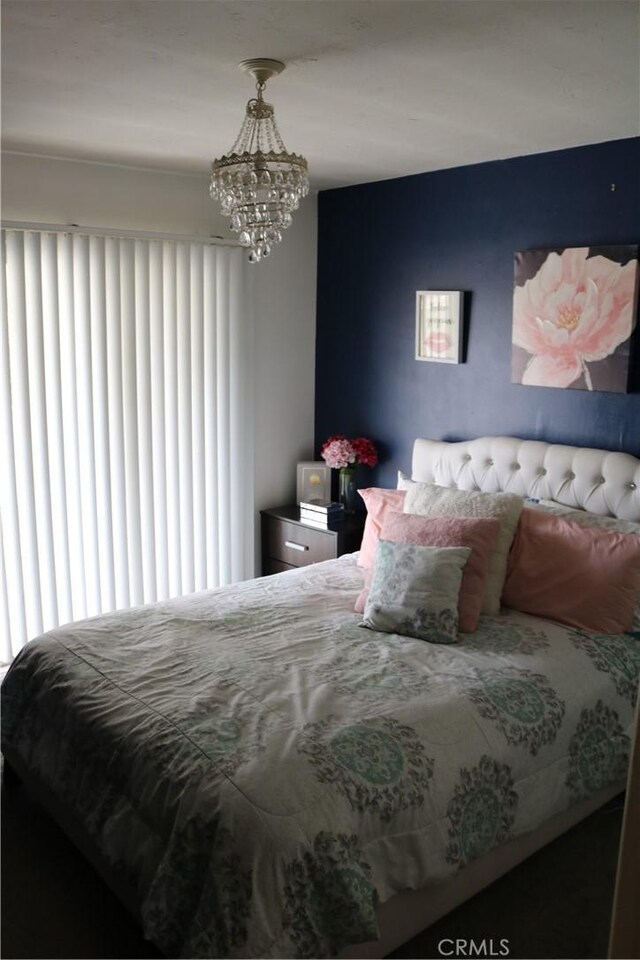 3641 W Oak Ave, Fullerton, CA 92833 - bedroom featuring multiple windows and a chandelier