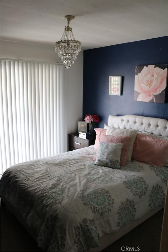 3641 W Oak Ave, Fullerton, CA 92833 - bedroom with multiple windows and a chandelier