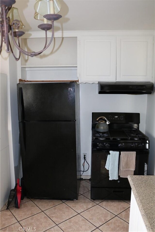 3641 W Oak Ave, Fullerton, CA 92833 - kitchen featuring black appliances, under cabinet range hood, white cabinetry, and light tile patterned floors