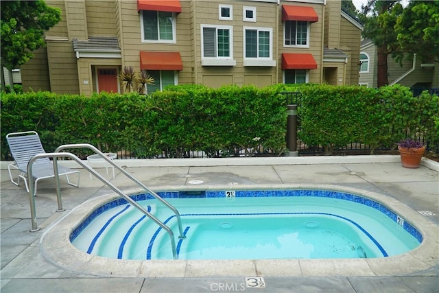 7262 Yellowtail Dr Unit 206, Huntington Beach, CA 92648 - view of pool with a hot tub