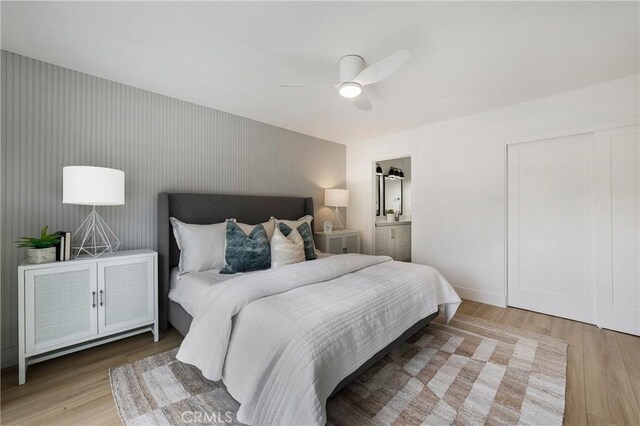44 Seton Rd, Irvine, CA 92612 - bedroom with wood finished floors, a ceiling fan, and ensuite bathroom