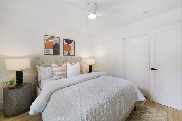44 Seton Rd, Irvine, CA 92612 - bedroom with wood finished floors, a closet, and a ceiling fan