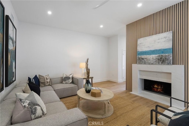44 Seton Rd, Irvine, CA 92612 - living room with a premium fireplace, wood finished floors, and recessed lighting