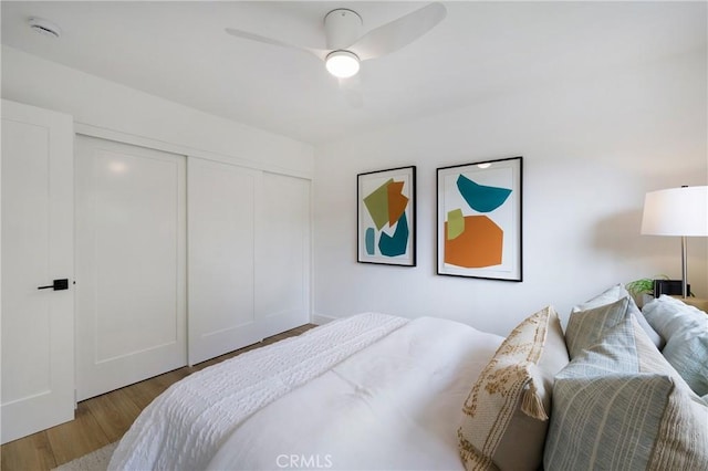 44 Seton Rd, Irvine, CA 92612 - bedroom featuring wood finished floors, a closet, and ceiling fan
