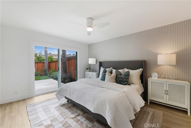 44 Seton Rd, Irvine, CA 92612 - bedroom with access to outside, a ceiling fan, and wood finished floors