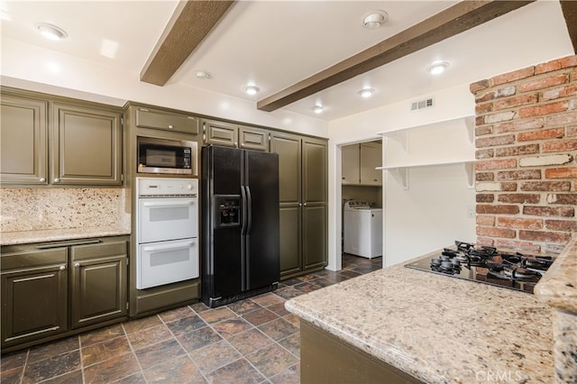 10430 Balboa Blvd, Granada Hills, CA 91344 - kitchen featuring black appliances, washer / dryer, beamed ceiling, stone finish flooring, and open shelves