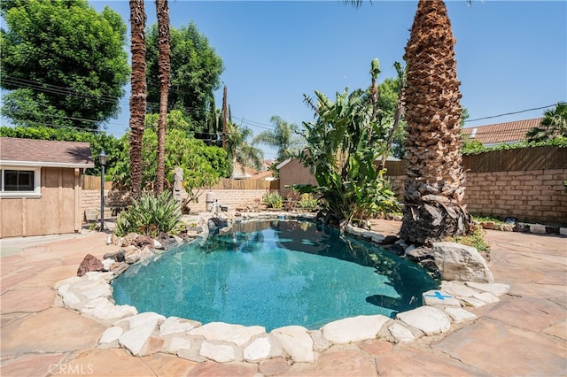 10430 Balboa Blvd, Granada Hills, CA 91344 - view of swimming pool featuring a fenced backyard and a patio
