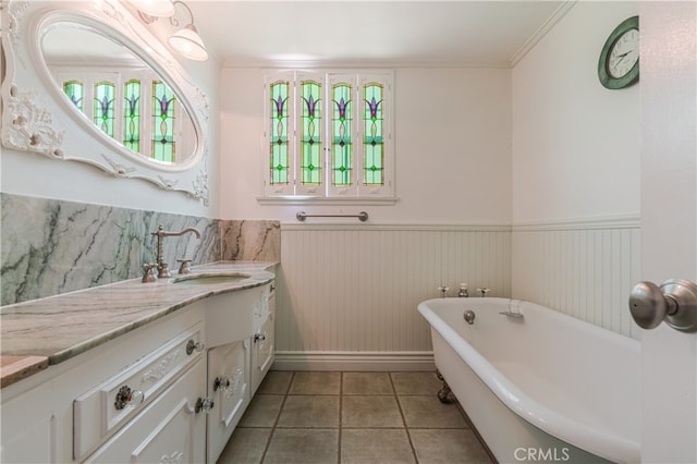 10430 Balboa Blvd, Granada Hills, CA 91344 - bathroom featuring vanity, wainscoting, a freestanding bath, tile patterned flooring, and healthy amount of natural light