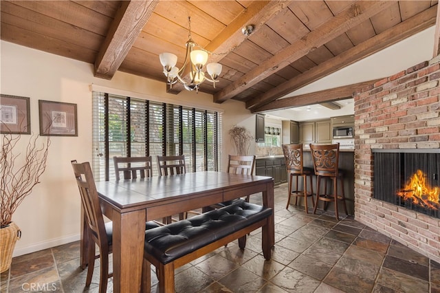 10430 Balboa Blvd, Granada Hills, CA 91344 - dining area with wood ceiling, stone tile flooring, plenty of natural light, a chandelier, and a fireplace