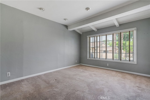 10430 Balboa Blvd, Granada Hills, CA 91344 - carpeted empty room featuring beam ceiling and a smoke detector