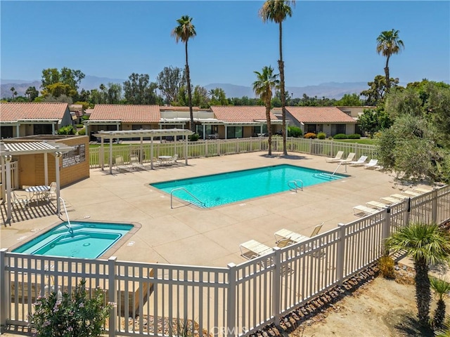 40316 Bay Hill Way, Palm Desert, CA 92211 - community pool with a community hot tub, a patio area, and a residential view