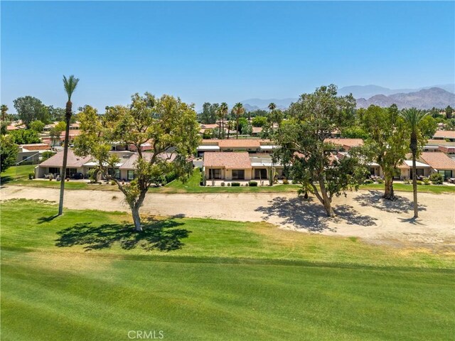 40316 Bay Hill Way, Palm Desert, CA 92211 - view of home's community with a residential view, a mountain view, and a yard