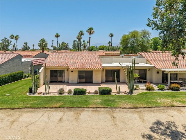 40316 Bay Hill Way, Palm Desert, CA 92211 - back of property with stucco siding, a tile roof, a yard, and a patio