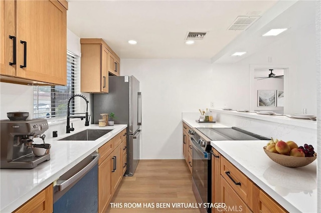 40316 Bay Hill Way, Palm Desert, CA 92211 - kitchen with stainless steel appliances, light wood-type flooring, recessed lighting, and ceiling fan