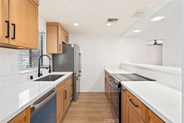 40316 Bay Hill Way, Palm Desert, CA 92211 - kitchen featuring stainless steel appliances, light wood-type flooring, a ceiling fan, and recessed lighting