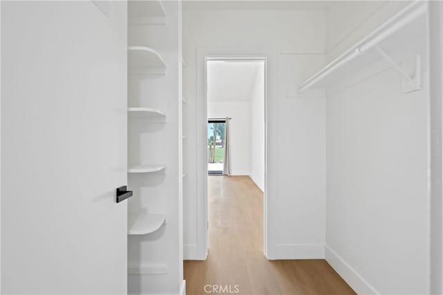 40316 Bay Hill Way, Palm Desert, CA 92211 - spacious closet featuring wood finished floors