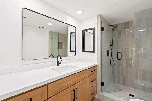 40316 Bay Hill Way, Palm Desert, CA 92211 - bathroom with a shower stall, vanity, and recessed lighting
