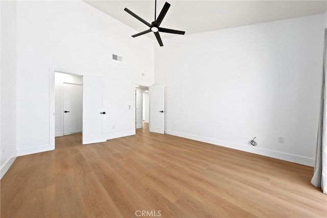 40316 Bay Hill Way, Palm Desert, CA 92211 - unfurnished bedroom with light wood-type flooring, high vaulted ceiling, and a ceiling fan