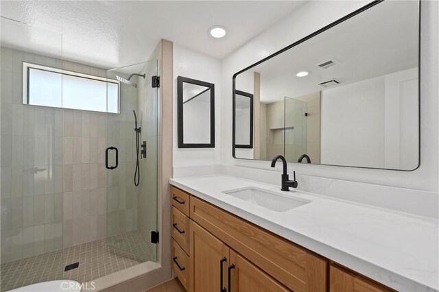 40316 Bay Hill Way, Palm Desert, CA 92211 - bathroom with vanity and a shower stall