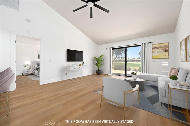 40316 Bay Hill Way, Palm Desert, CA 92211 - living room featuring high vaulted ceiling, ceiling fan, and wood finished floors